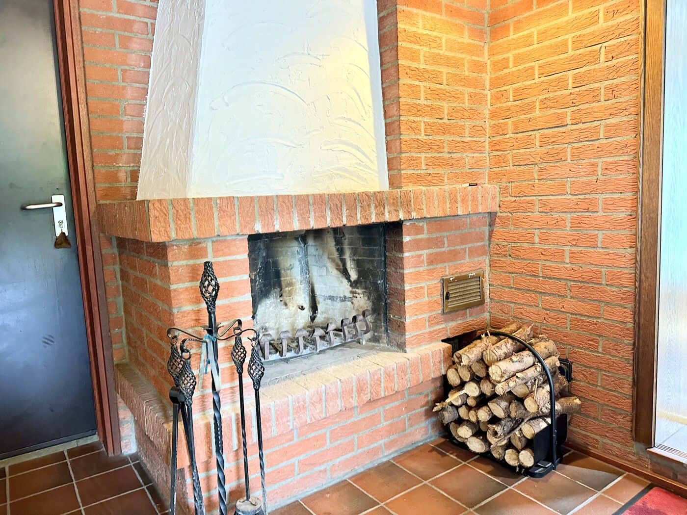 Wintergarten mit Kamin