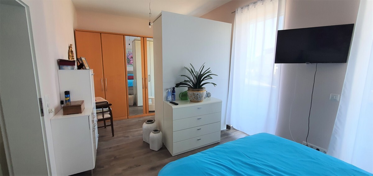 Schlafzimmer mit gestalteter Ankleide