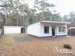 Ansicht Bungalow und Stellplatz