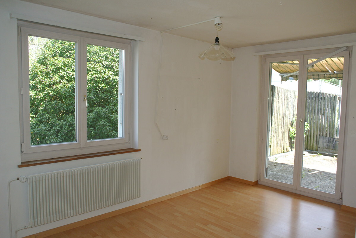 Schlafzimmer mit Ausgang auf Terrasse