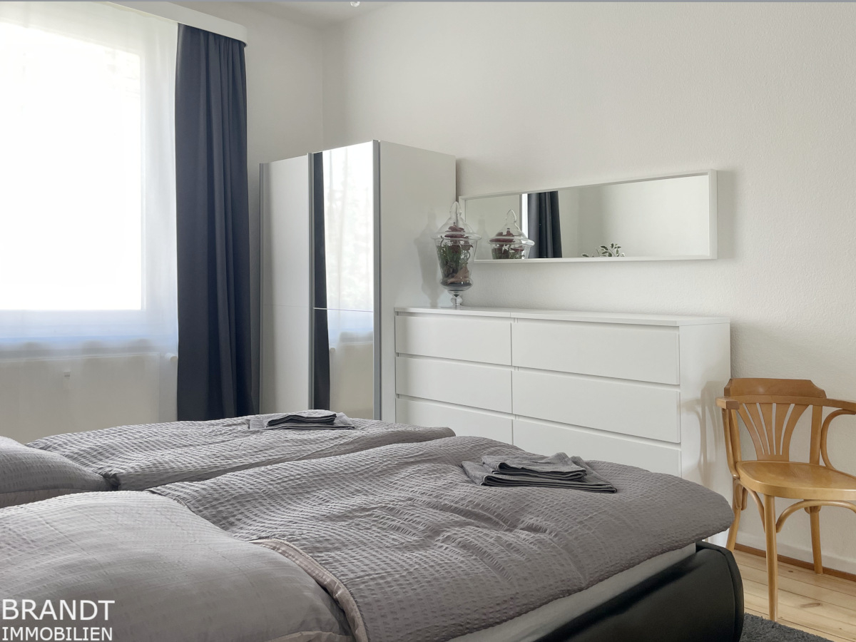 Komplett saniert und neuwertig möbliert mit Balkon in zentraler Lage! - Foto 5