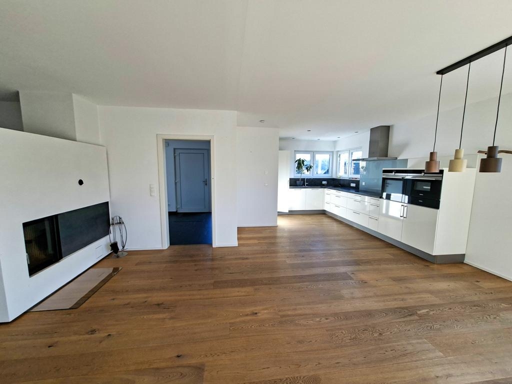 Wohn- und Esszimmer mit Kamin