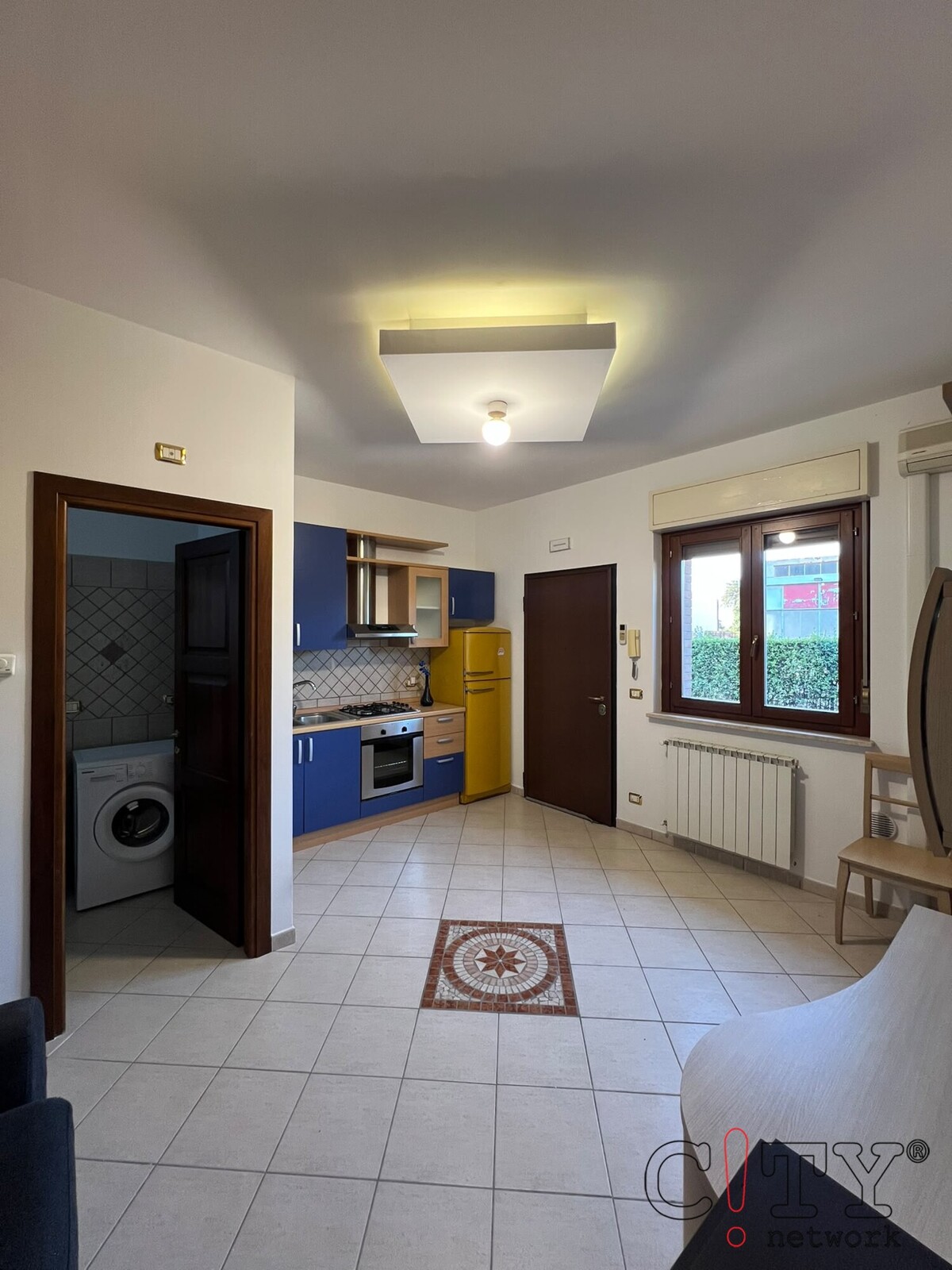 Soggiorno con cucina a vista