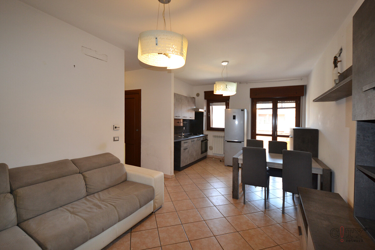 Soggiorno con cucina a vista 