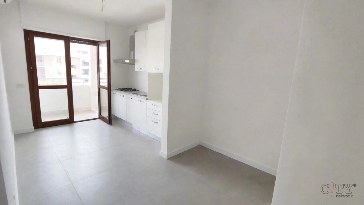 Soggiorno con cucina a vista