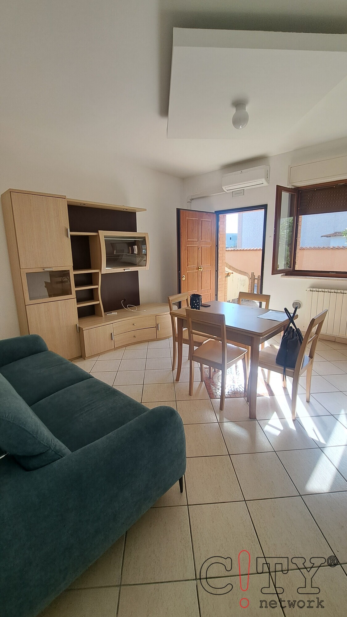 Soggiorno con cucina a vista