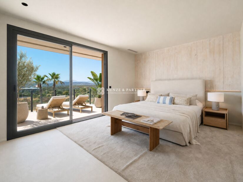 Schlafzimmer mit Zugang zur Terrasse