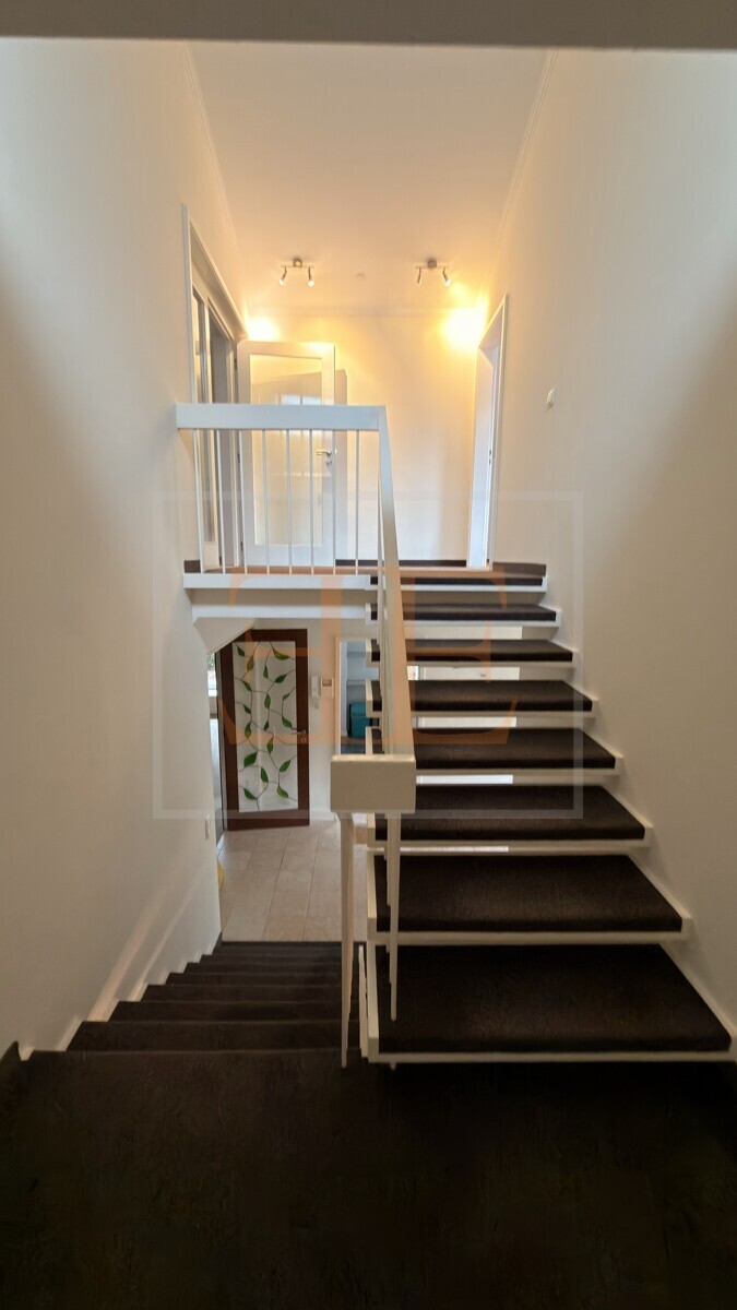 Treppe ins Obergeschoss
