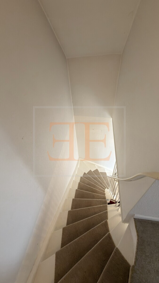 Treppe ins Obergeschoss