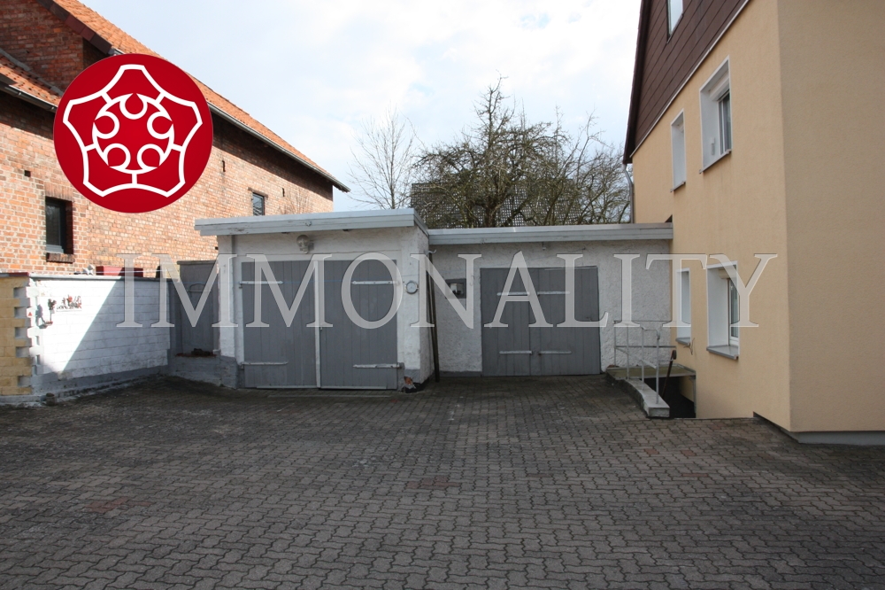 1 Garage + 2 Schuppen