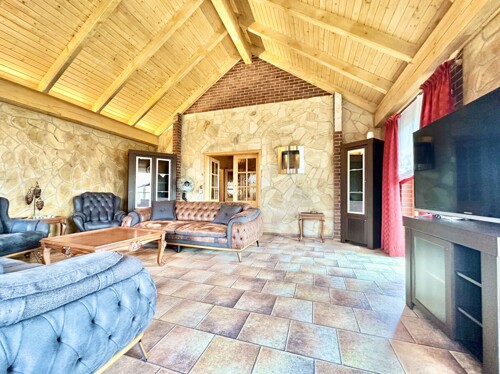 Wohnzimmer mit Gartenzugang EG 