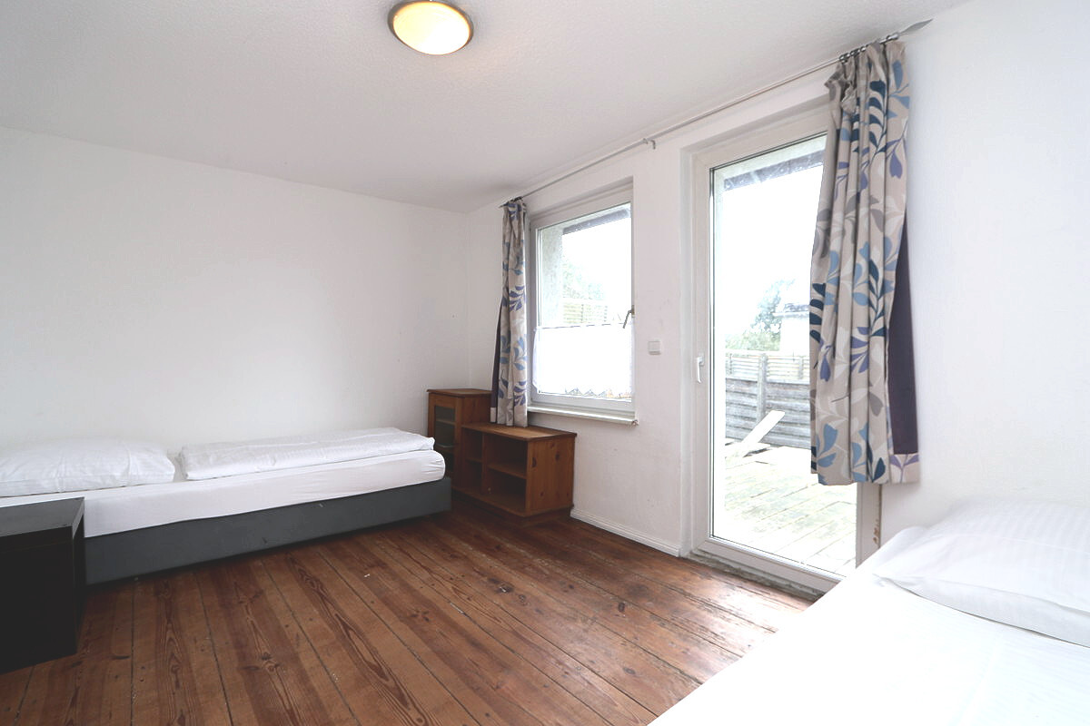 Das Schlafzimmer mit Terrassenzugang