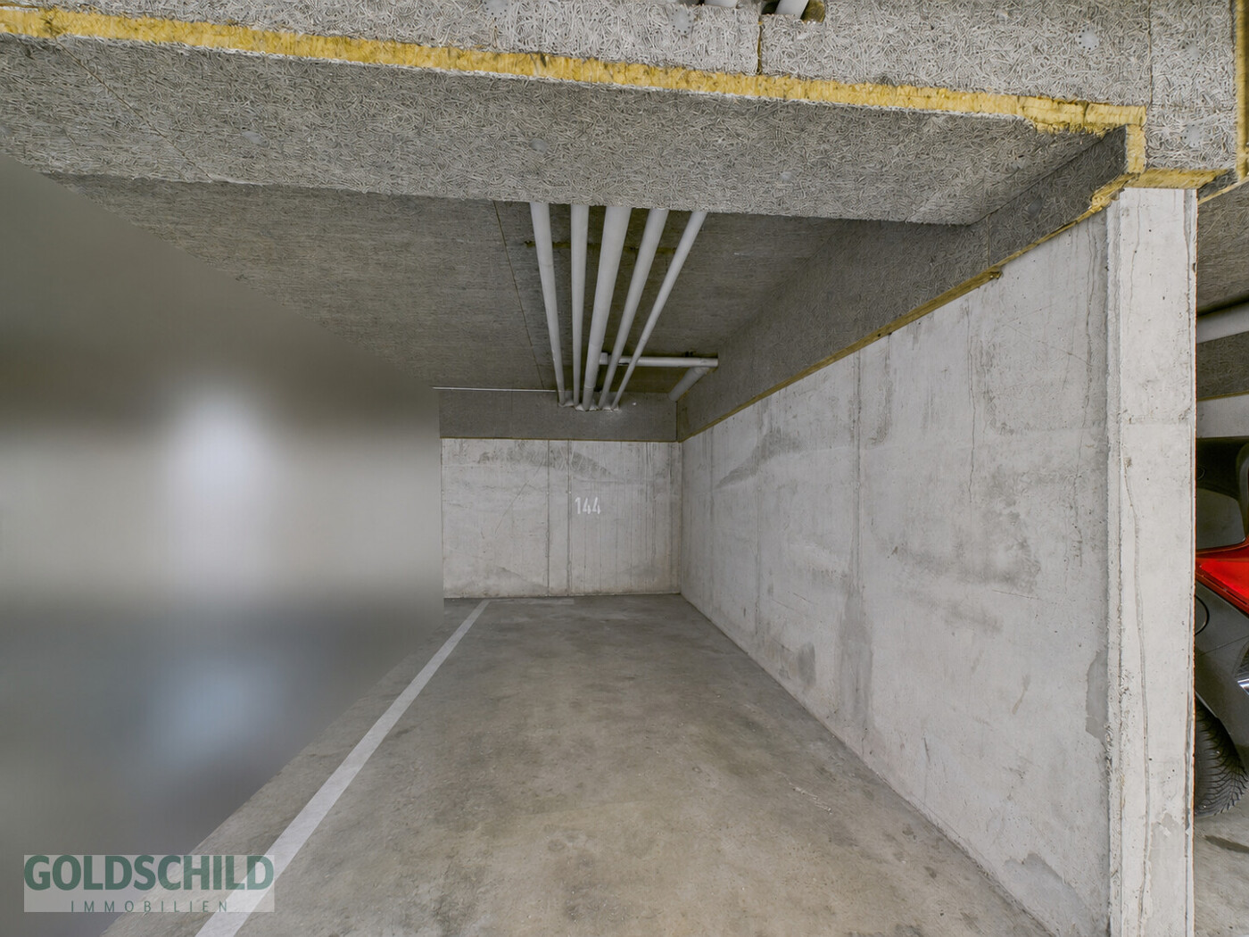Appartamento_Neckartenzlingen_Posto_auto_in_garage_interrato (modificato con IA)