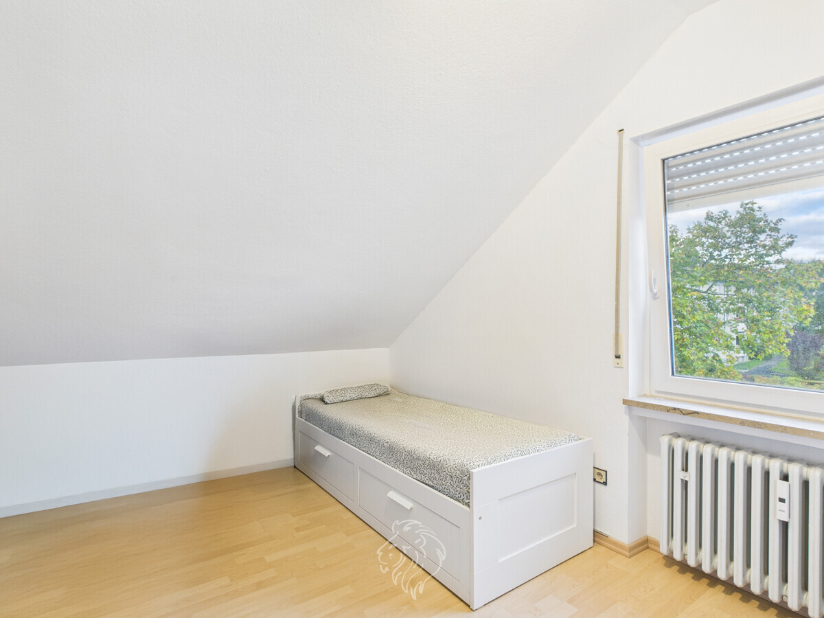 Wohnung DG links /  Schlafzimmer