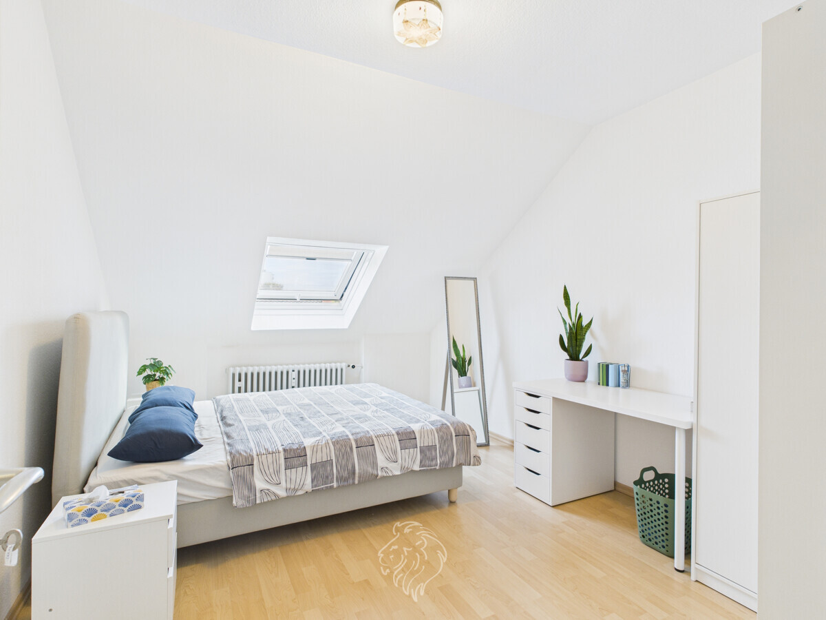Wohnung DG links / Schlafzimmer