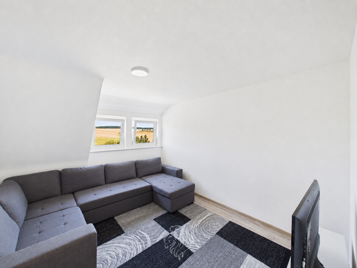 Wohnzimmer OG linkes Haus (wurde digital bearbeitet)
