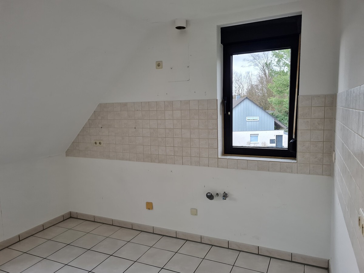 Heimelige Dachgeschosswohnung in ruhiger Waldrandlage von Schildgen !!! - Foto 1