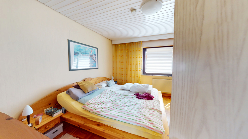 Wohnung 1: Schlafzimmer
