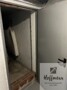 Keller Durchgang zur Doppelgarage - mit KI aufgeräumt