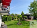 Garten mit Balkon - Mit KI bearbeitet