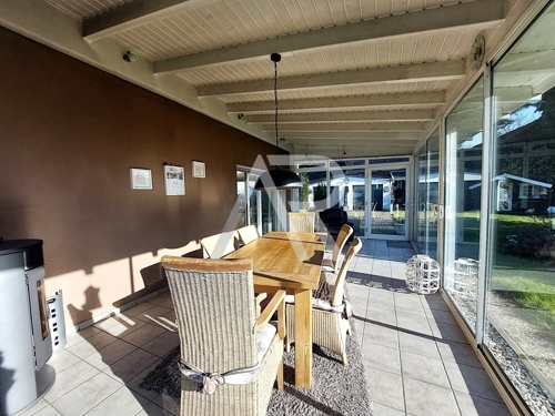 Wintergarten mit Kaminofen