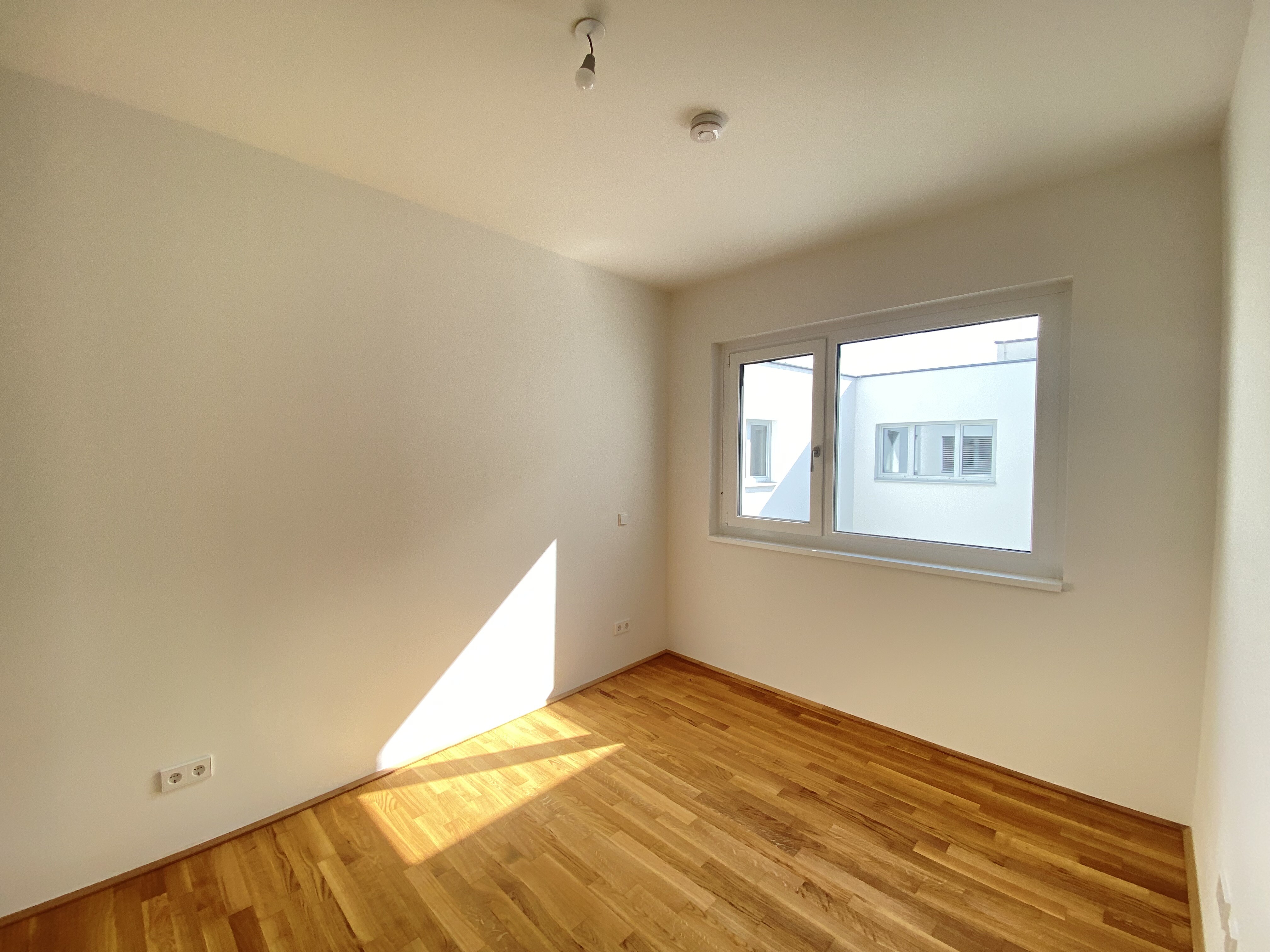 Schlafzimmer in den Innenhof