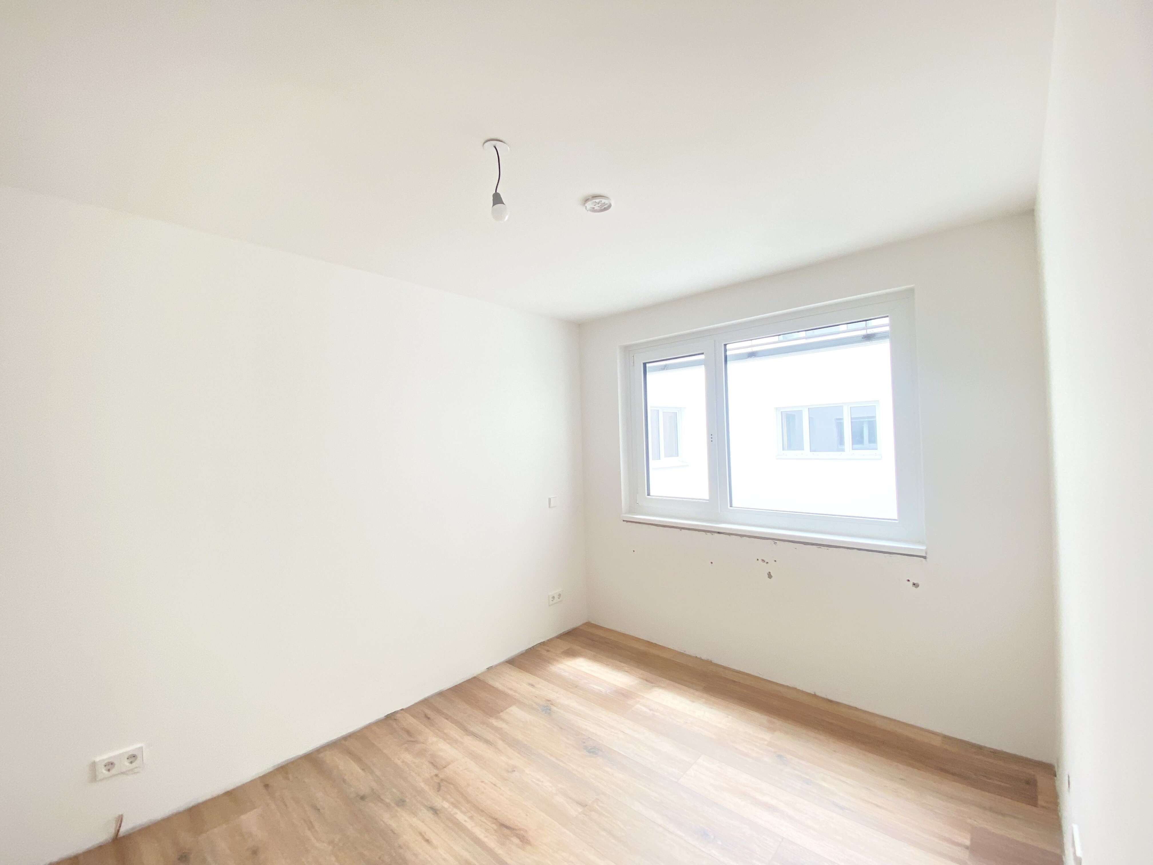 Schlafzimmer in den Innenhof