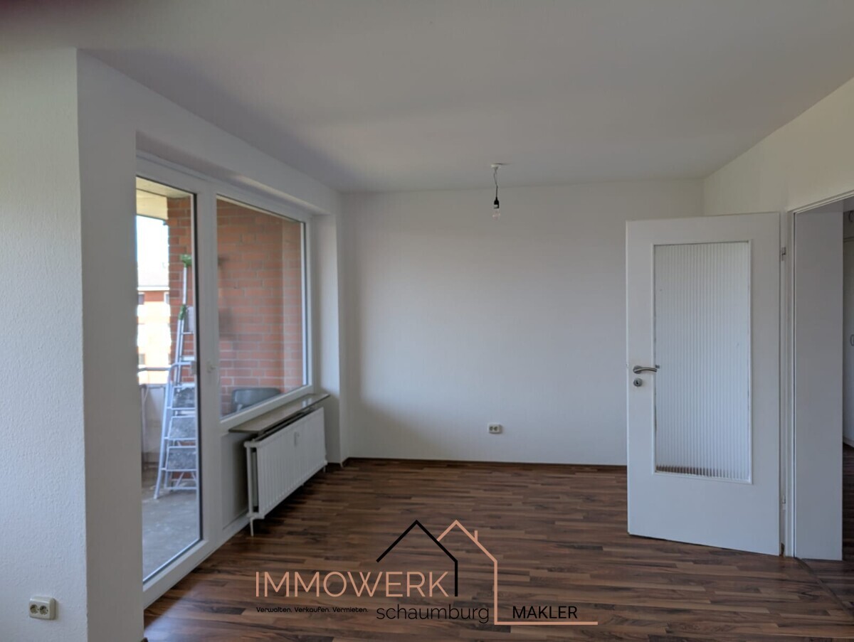 Wohnzimmer mit Zugang zur Loggia 