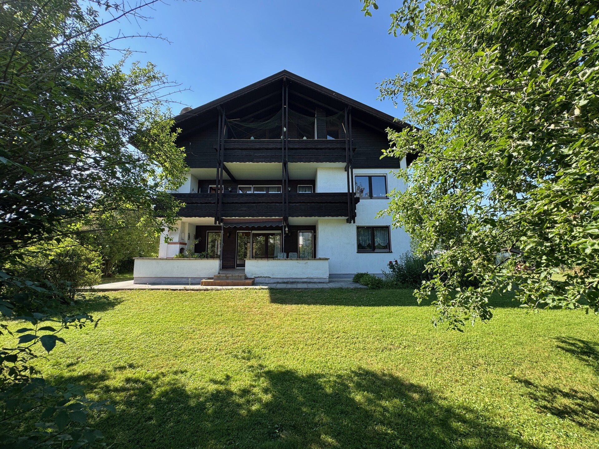 Wohnung kaufen - wie in einem Haus leben - Erdgeschoss mit sonniger Südostterrasse und großem Garten
