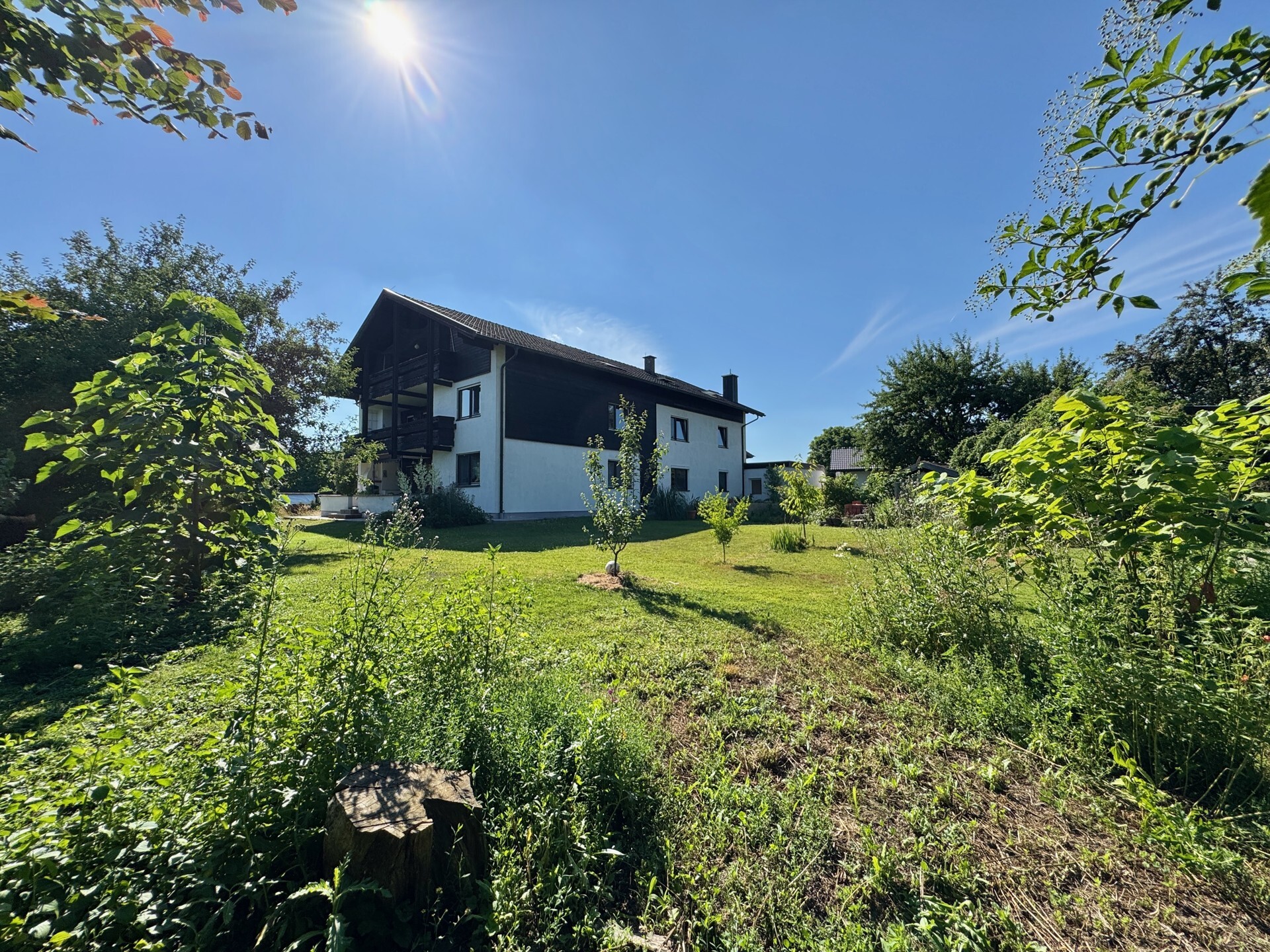 Wohnung kaufen - wie in einem Haus leben - Erdgeschoss mit sonniger Südostterrasse und großem Garten