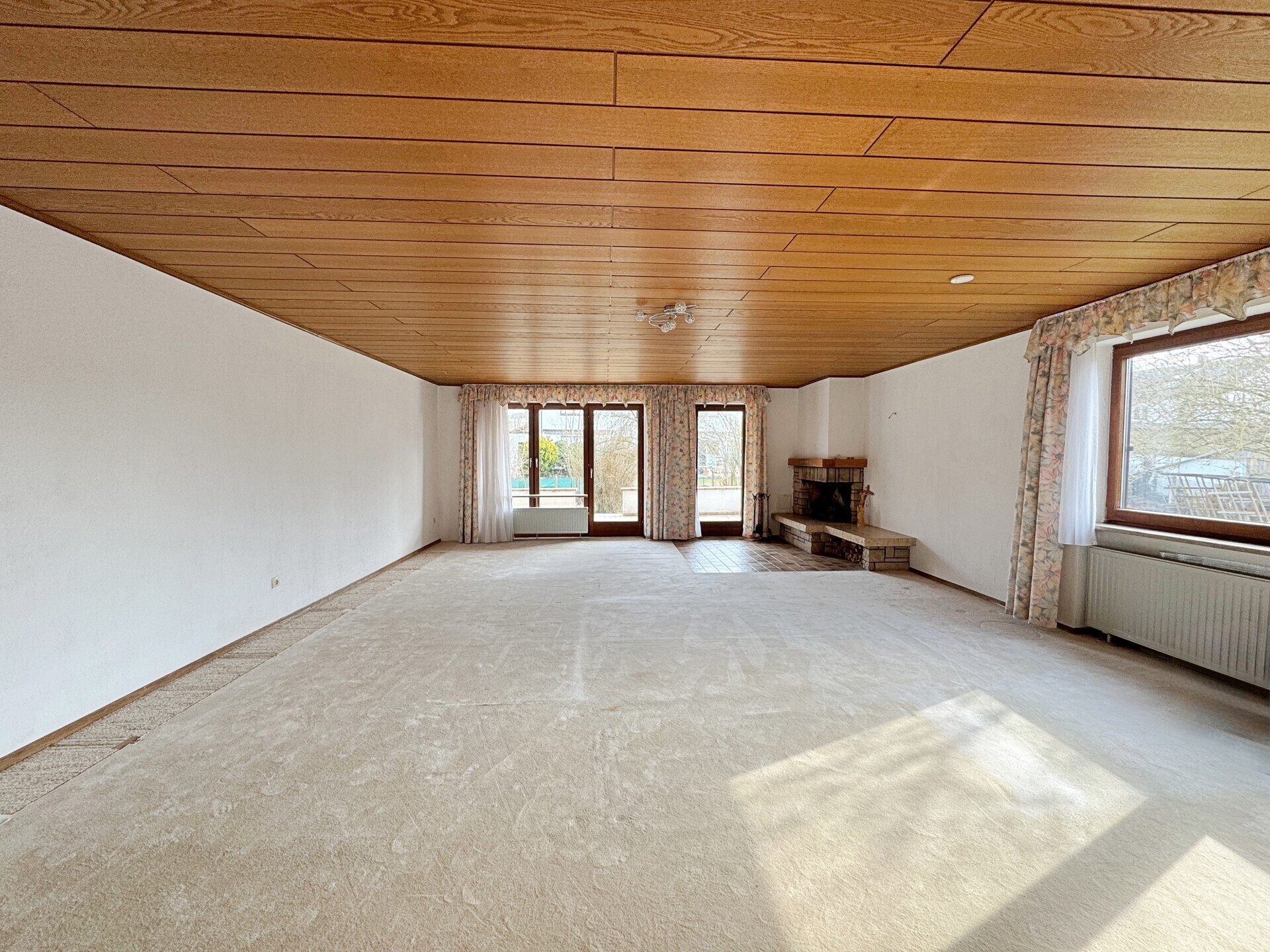 Wohnung kaufen - wie in einem Haus leben - Erdgeschoss mit sonniger Südostterrasse und großem Garten