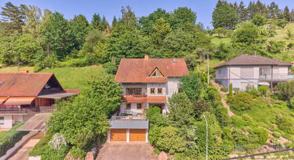 Ein Zuhause mit Charakter - Architektenhaus auf parkähnlichem Traumgrundstück in sonniger Hanglage!