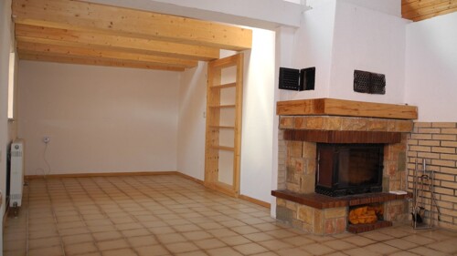 Wohnzimmer mit Kamin