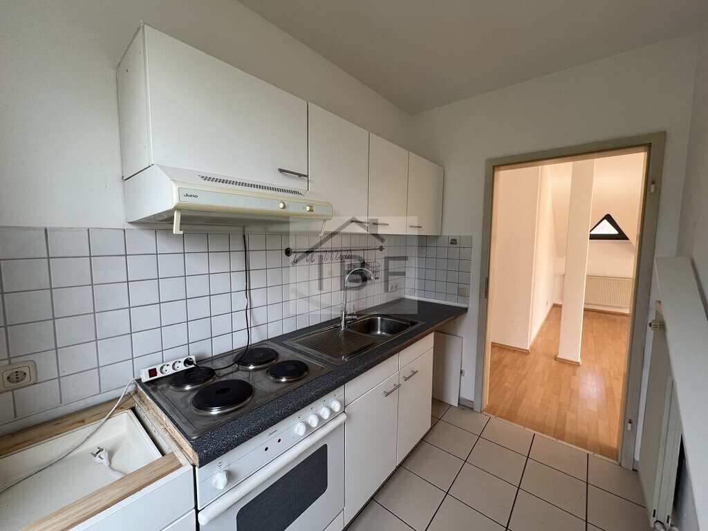 Charmante Maisonettewohnung mit Balkon in Freudenberg-Lindenberg - Foto 1
