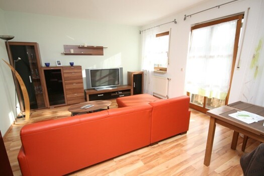 Wohnzimmer mit Balkon