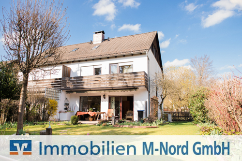 Hausansicht mit Garten