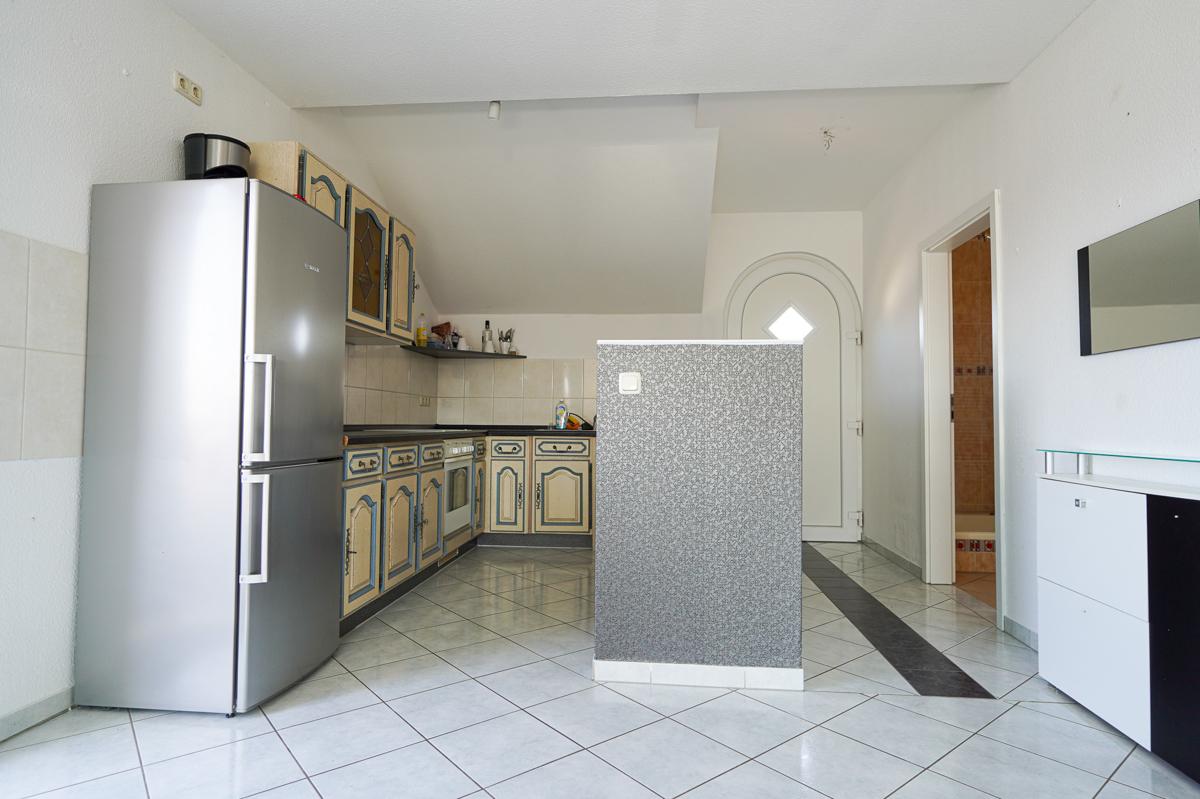 OG Wohnung 3 Eingang mit offener Küche