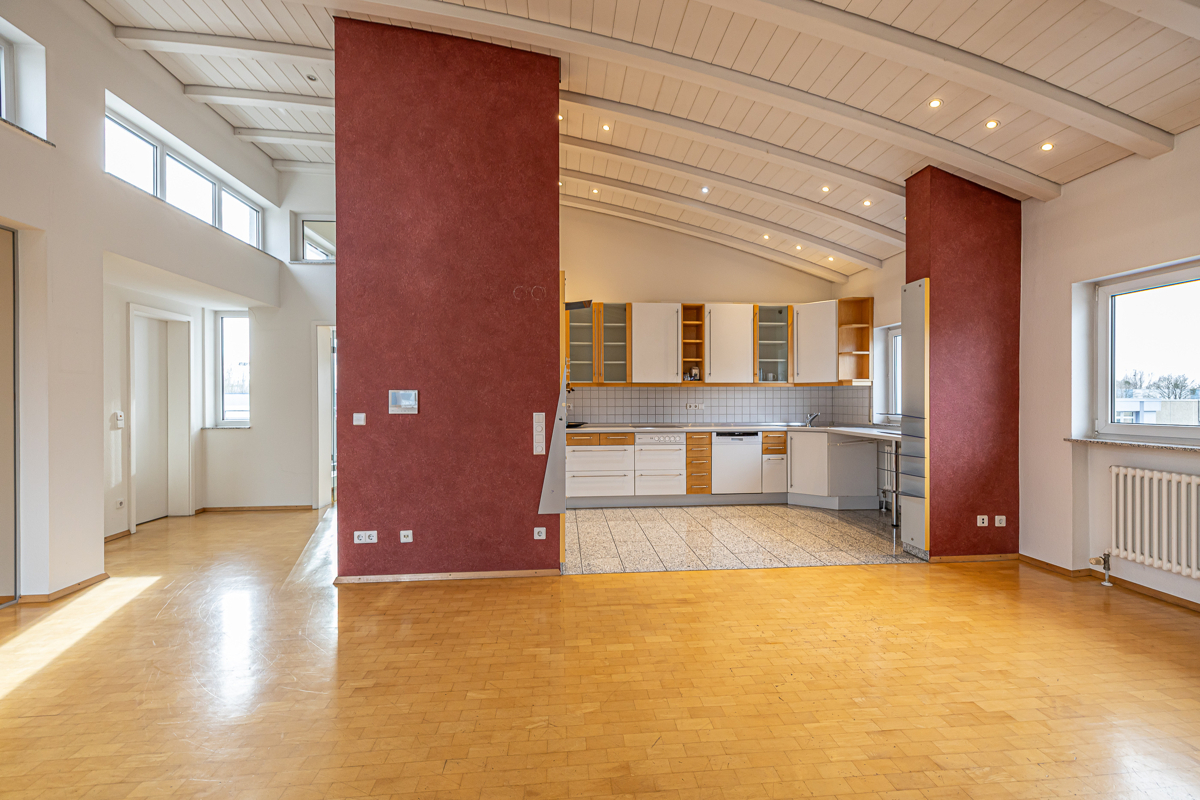 Impression Penthouse_offener Wohn- und Essbereich mit Küche