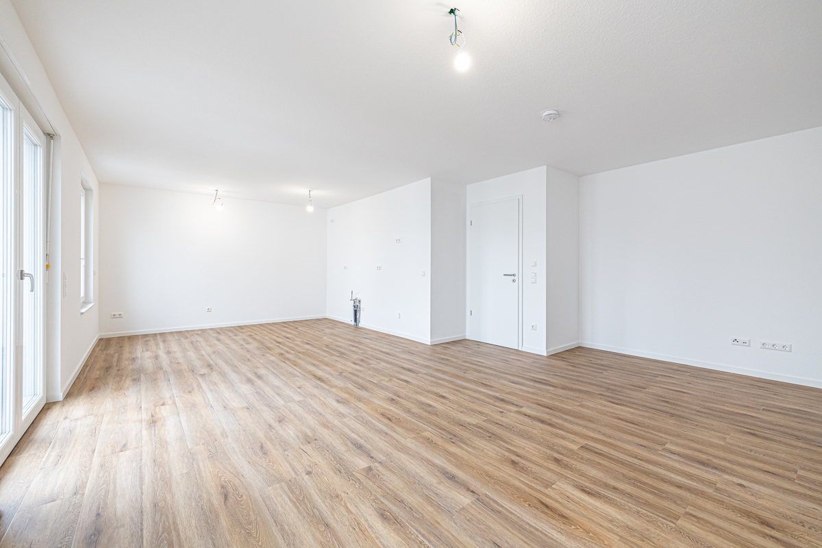 Wohn- und Esszimmer mit offener Küche