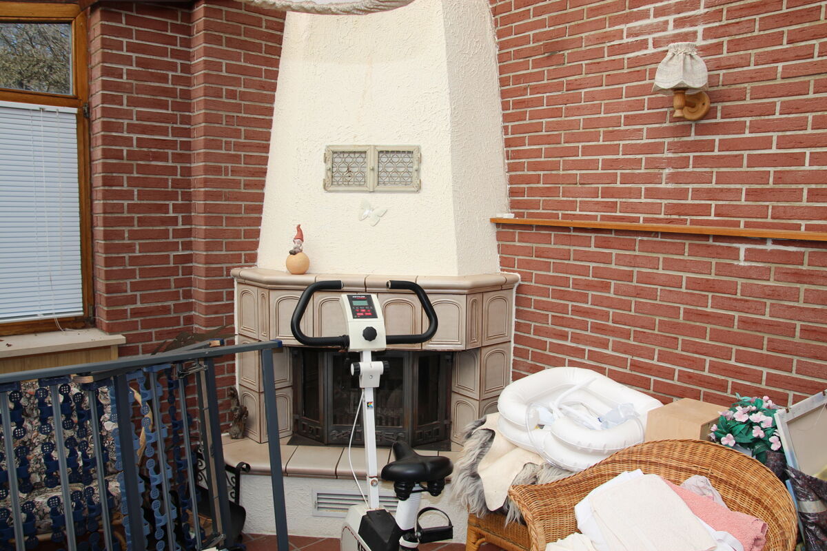 Wintergarten mit Kamin
