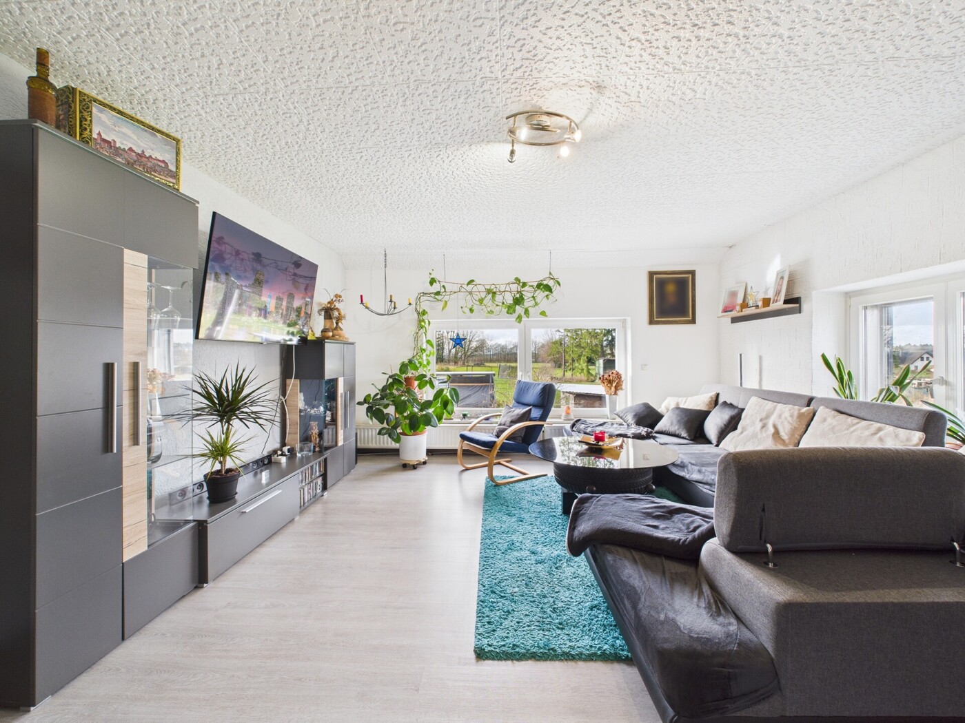 Wohnzimmer in EG Whg. Hausnr.106a