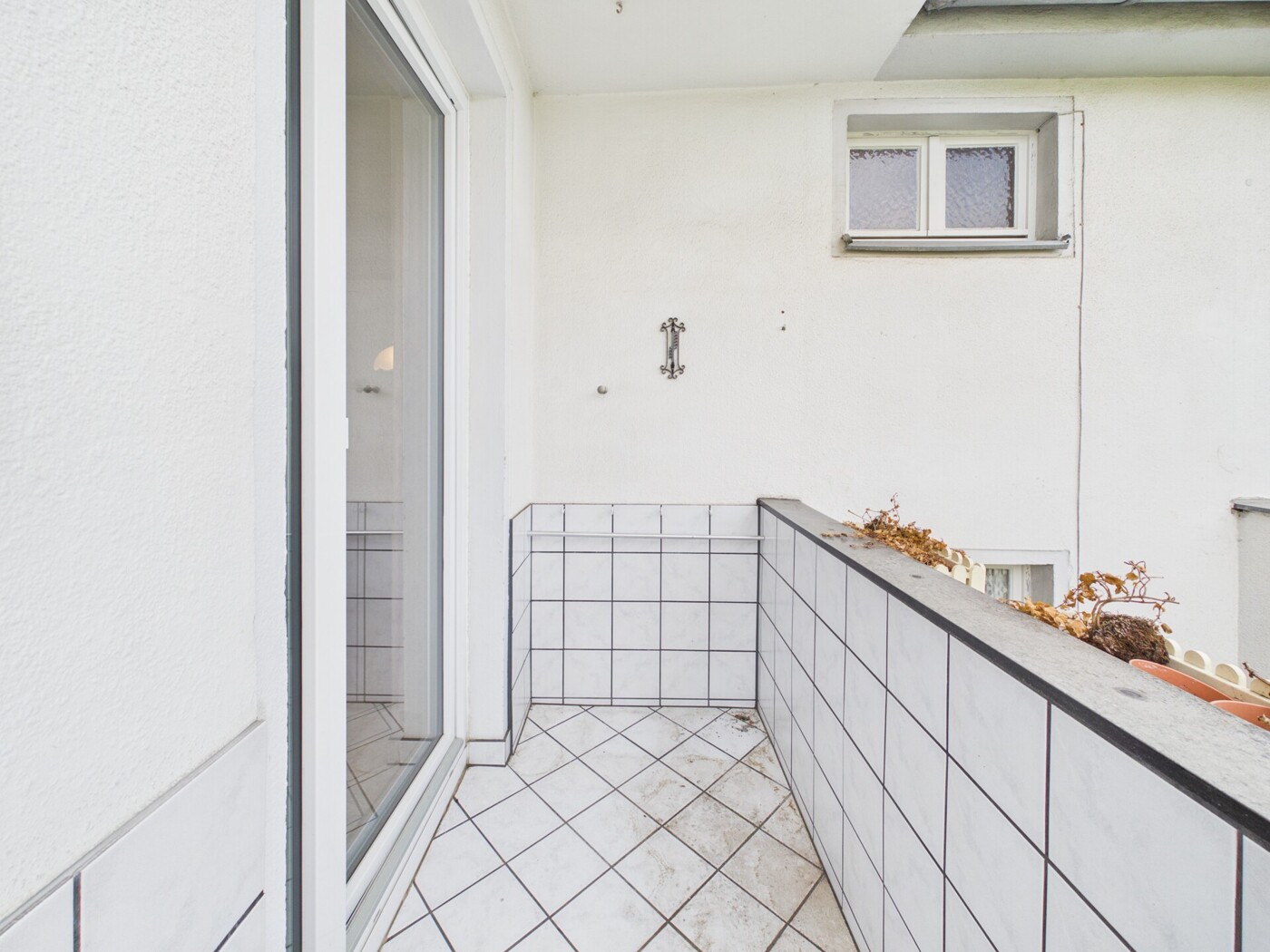 Überdachter Balkon