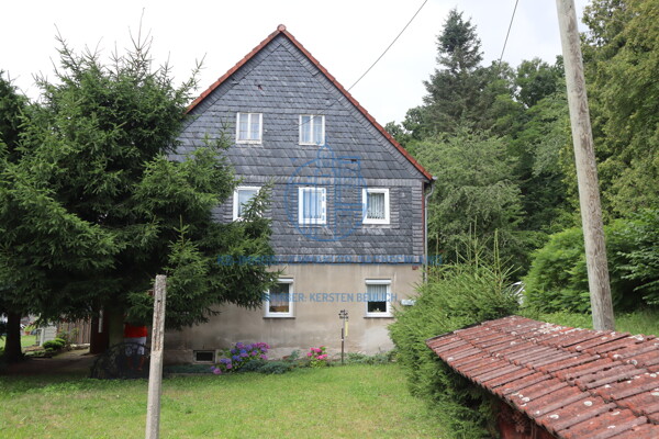 Giebelansicht mit anteiliger Schieferfassade