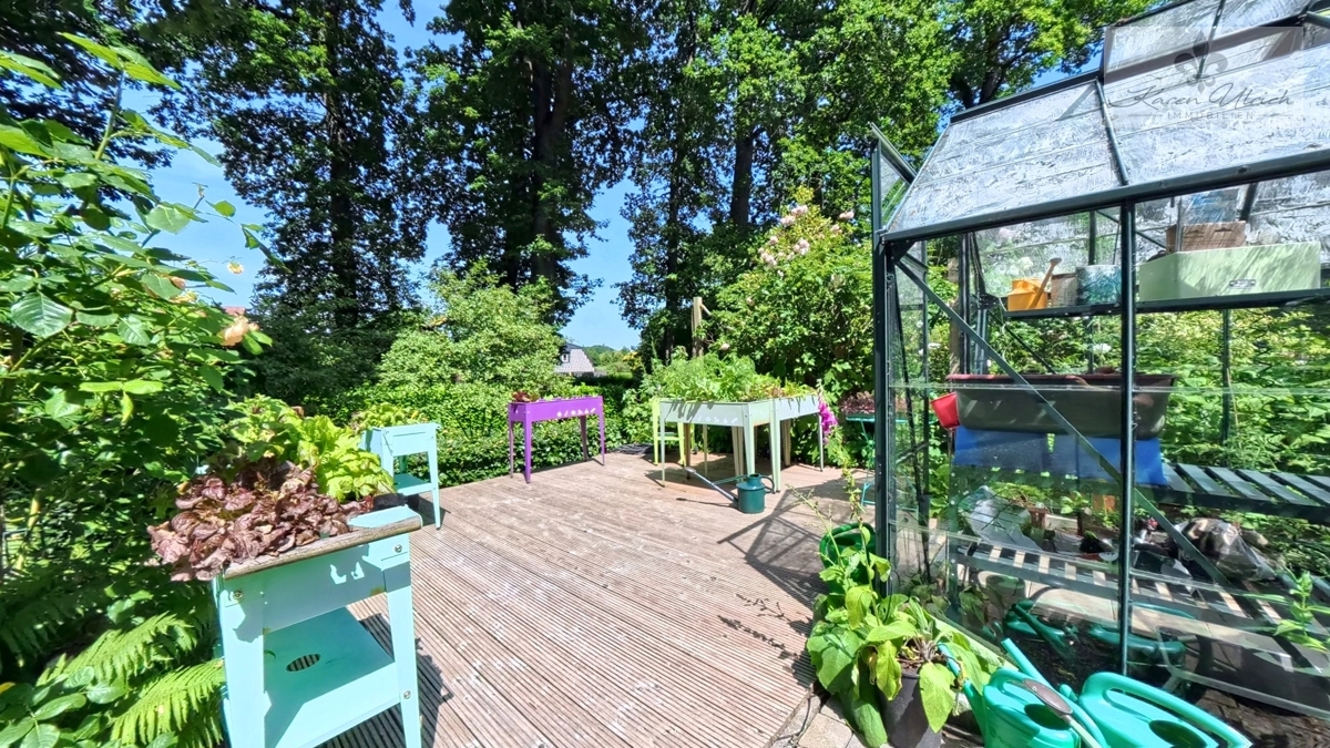 Terrasse vorm Gewächshaus