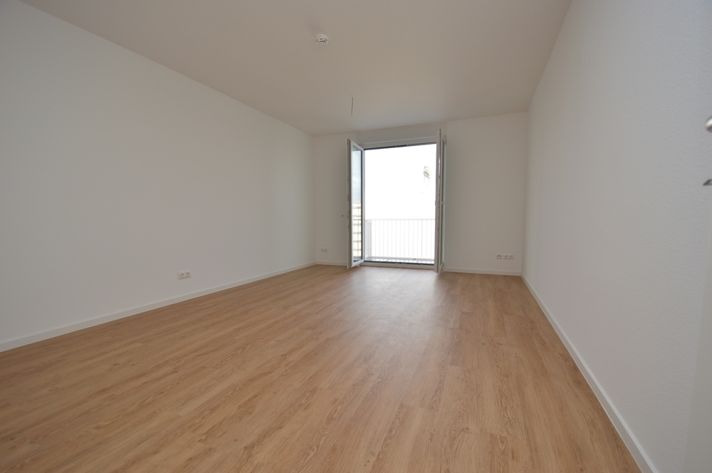 Urbaner Neubaukomfort mit grünem Innenhof - Perfekt für junge Familien - Foto 1