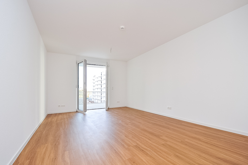 Urbaner Neubaukomfort mit grünem Innenhof - Perfekt für junge Familien - Foto 1