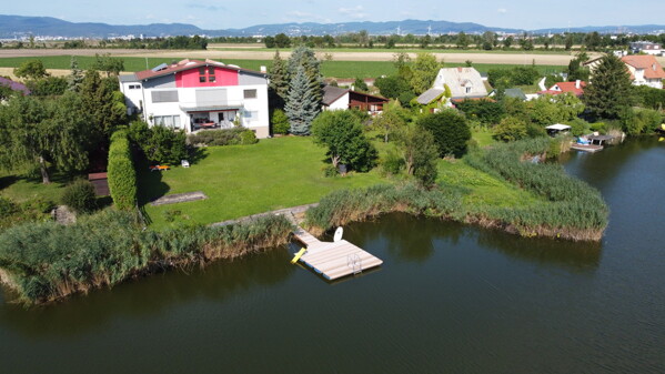 Haus mit Garten & Uferlinie