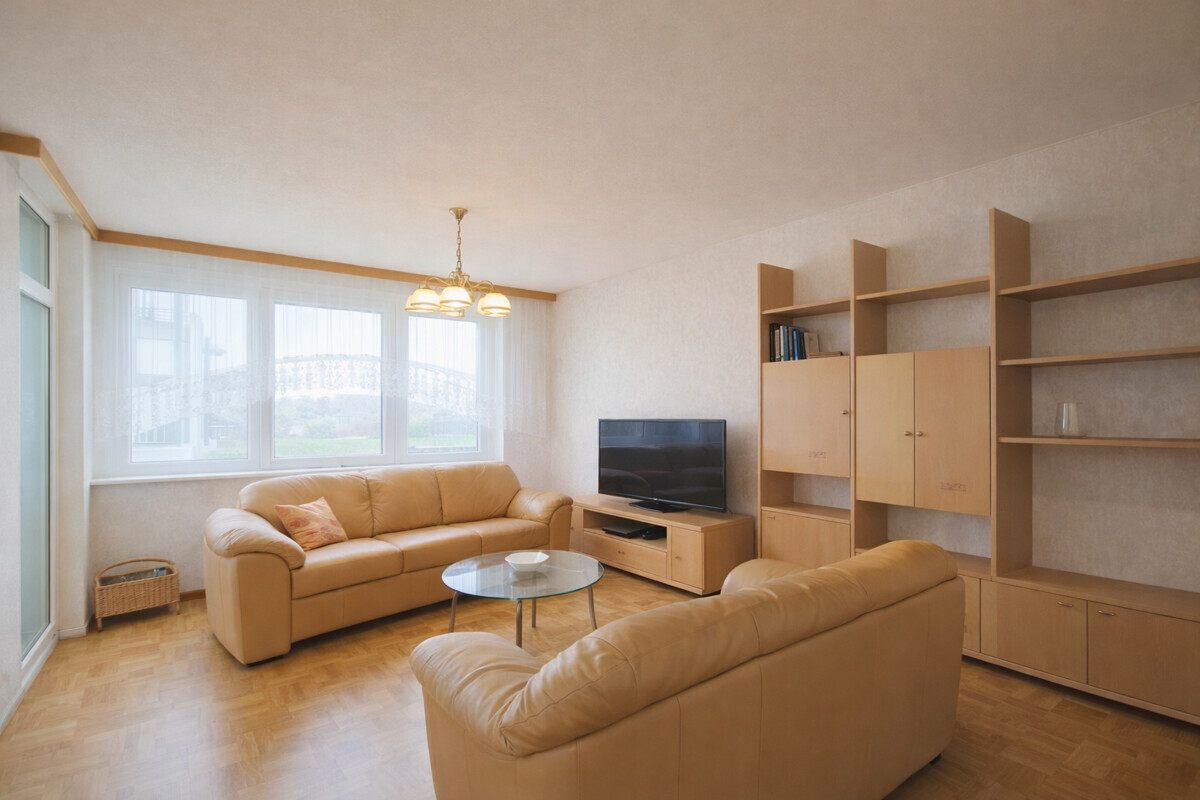 Modern living room with peach sofas