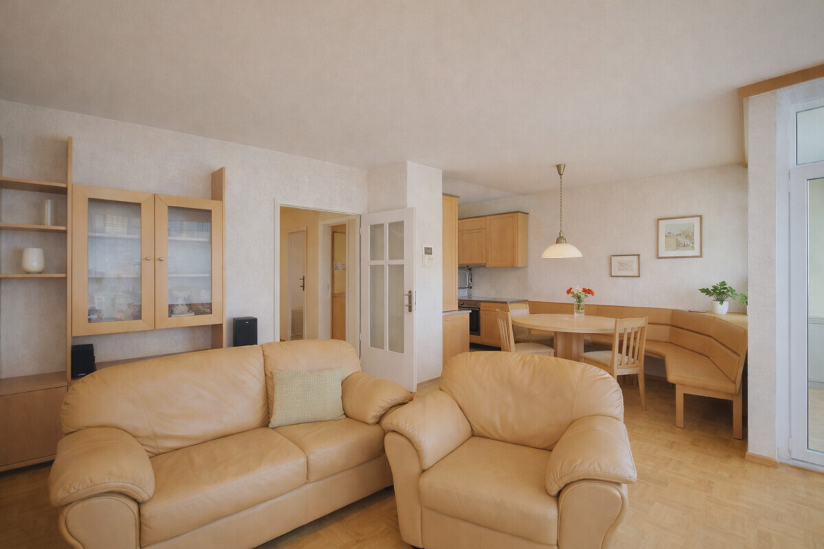 Contemporary beige living and dining area