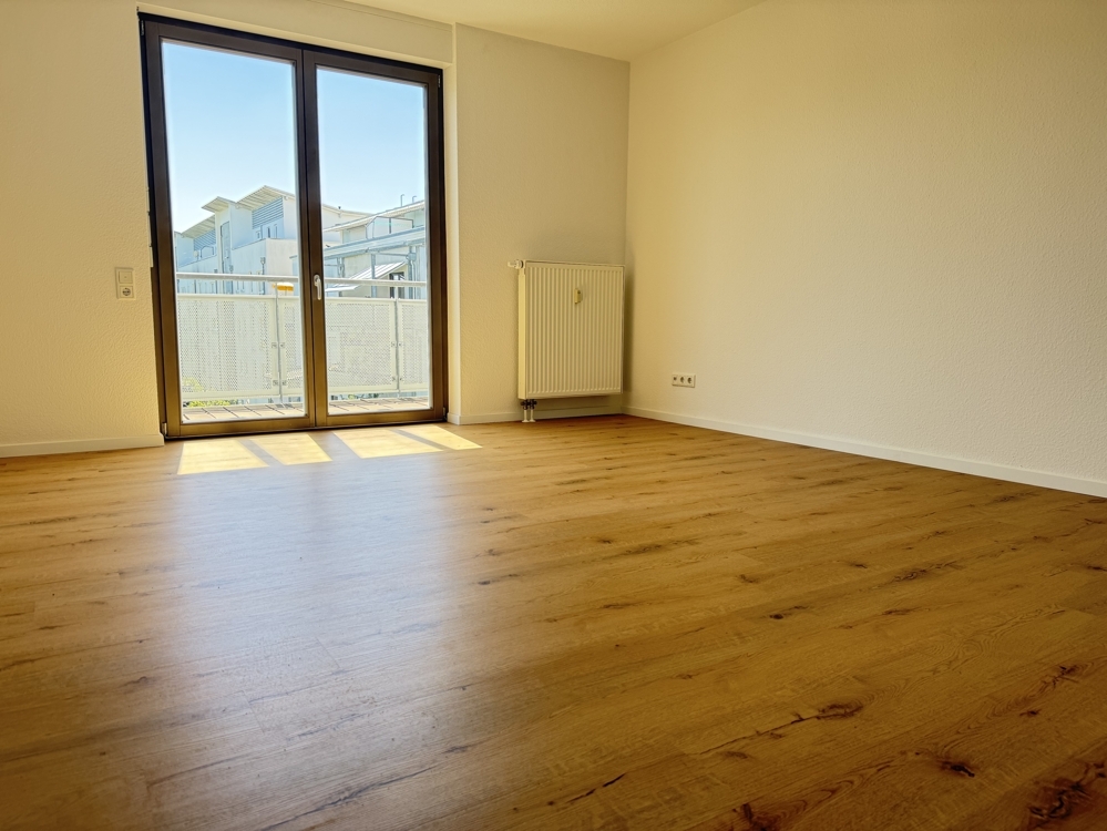 Sonnenhelle 2 Zi.-Wohnung mit Tageslichtbad plus Stellplatz mit Wallbox! - Photo 1
